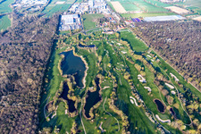 Blooming trees in the spring on the grounds of the Golf course at Landgut Dreihof GOLF absolute in Essingen in the state Rhineland-Palatinate seen from above