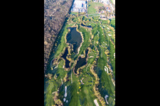 Blooming trees in the spring on the grounds of the Golf course at Landgut Dreihof GOLF absolute in Essingen in the state Rhineland-Palatinate from the plane