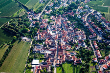 Village - view on the edge of agricultural fields and farmland in Grosskarlbach in the state Rhineland-Palatinate