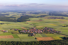 Oblique view of Village - view on the edge of agricultural fields and farmland in Ebertshausen in the state Bavaria