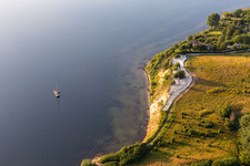 Oblique view of Water surface at the seaside in the Flensburger Foerde in Holnis in the state Schleswig-Holstein, Germany