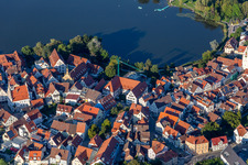 City view of the downtown area on the shore areas of Stadt See in Bad Waldsee in the state Baden-Wuerttemberg, Germany from above