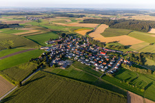 Agricultural land and field boundaries surround the settlement area of the village in Bierstetten in the state Baden-Wuerttemberg, Germany