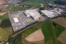 Bird's eye view of Building and production halls on the premises of Liebherr-Mischtechnik GmbH in Bad Schussenried in the state Baden-Wuerttemberg, Germany