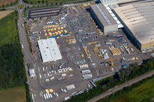 Building and production halls on the premises of Liebherr-Mischtechnik GmbH in Bad Schussenried in the state Baden-Wuerttemberg, Germany viewn from the air
