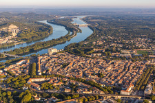 City view on the river bank of the river Rhone with castle Chateau de Tarascon in Tarascon in Provence-Alpes-Cote d'Azur, France