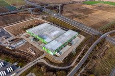 New building of the Pfalzmarkt for fruit and vegetables in Mutterstadt in the state Rhineland-Palatinate, Germany from above
