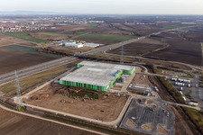 New building of the Pfalzmarkt for fruit and vegetables in Mutterstadt in the state Rhineland-Palatinate, Germany seen from above