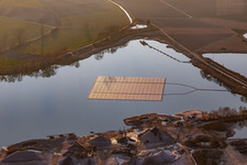 Aerial view of Floating photovoltaic island on the quarry lake in Leimersheim in the state Rhineland-Palatinate, Germany
