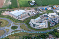 Business park at the exhibition center in the district Queichheim in Landau in der Pfalz in the state Rhineland-Palatinate, Germany seen from above