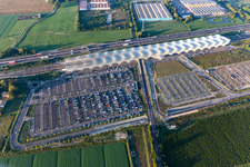 Parking next to the Autostrade del Sole at Reggio Emilia AV Mediopadana train station in Reggio nell’Emilia in the state Reggio Emilia, Italy