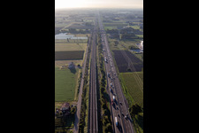 Aerial photograpy of Autostrada del Sole next to the high-speed rail line in San Martino in Rio in the state Reggio Emilia, Italy