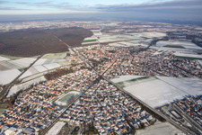 Railway line in winter with snow in Rheinzabern in the state Rhineland-Palatinate, Germany