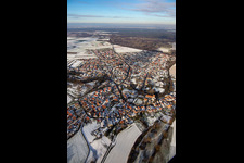 Aerial view of Bellheimer Straße in winter with snow in Hördt in the state Rhineland-Palatinate, Germany