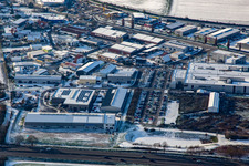 Industrial area on the leveling in winter with snow in Rülzheim in the state Rhineland-Palatinate, Germany