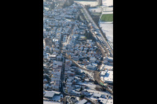 Bahnhofstraße in winter with snow in Rülzheim in the state Rhineland-Palatinate, Germany