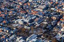 Holzgasse to Villa Wieser in winter with snow in Herxheim bei Landau in the state Rhineland-Palatinate, Germany