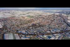City panorama in winter with snow in Herxheim bei Landau in the state Rhineland-Palatinate, Germany