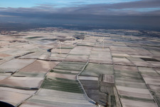 Aerial view of Wind farm in winter with snow in Offenbach an der Queich in the state Rhineland-Palatinate, Germany
