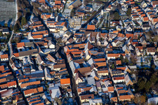 LandauerStraße /Bahnhofstraße in winter with snow in Insheim in the state Rhineland-Palatinate, Germany