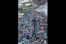 Aerial view of Back alley and main street in winter with snow in Rohrbach in the state Rhineland-Palatinate, Germany