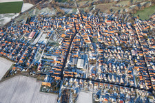 Aerial photograpy of Main street in winter with snow in Steinweiler in the state Rhineland-Palatinate, Germany