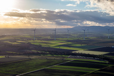 Open-space photovoltaic solar power system of the ANUMAR Solarpark Winden on a field in front of the Freckenfeld wind farm in Winden in the state Rhineland-Palatinate, Germany