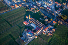 Aerial view of Renault Autohaus Schreieck GmbH in front of the Albert Götz KG winery in Kirrweiler in the state Rhineland-Palatinate, Germany
