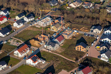 Aerial view of Rosenweg in the new development area K2 in winter in Kandel in the state Rhineland-Palatinate, Germany