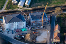 Aerial view of New construction of age-appropriate apartments at the railway crossing in the district Schaidt in Wörth am Rhein in the state Rhineland-Palatinate, Germany