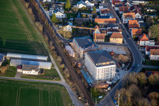 Oblique view of New construction of age-appropriate apartments at the railway crossing in the district Schaidt in Wörth am Rhein in the state Rhineland-Palatinate, Germany