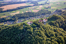 Aerial view of Church of Župnijska cerkev sv. Marije Vnebovzete and Café Huda Liza on the Vurberg in Duplek in the state Slovenia, Slovenia