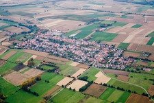 Village - view on the edge of agricultural fields and farmland in Minfeld in the state Rhineland-Palatinate