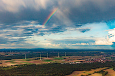 Aerial view of Rainbow over the wind turbines at Hatzenbühl in Hatzenbühl in the state Rhineland-Palatinate, Germany