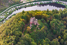 Aerial photograpy of Neudahn Castle ruins above the Neudahner Weiher campsite in Dahn in the state Rhineland-Palatinate, Germany