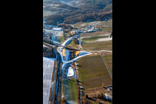 Construction site of the tunnel portal east for the Astrid Tunnel for the underpass and bypass of Bad Bergzabern between B38 (Weinstraße) and B427 (Kurtalstraße) in winter with snow in Dörrenbach in the state Rhineland-Palatinate, Germany