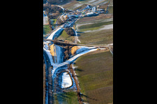 Aerial view of Construction site of the tunnel portal east for the Astrid Tunnel for the underpass and bypass of Bad Bergzabern between B38 (Weinstraße) and B427 (Kurtalstraße) in winter with snow in Dörrenbach in the state Rhineland-Palatinate, Germany