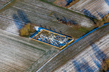 Cemetery in winter with snow in the district Kleinsteinfeld in Niederotterbach in the state Rhineland-Palatinate, Germany