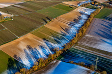 Field structures and shadows in winter with snow at the Dierbachtal in Minfeld in the state Rhineland-Palatinate, Germany