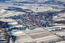 From the east in winter in the snow in the district Heuchelheim in Heuchelheim-Klingen in the state Rhineland-Palatinate, Germany