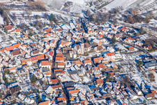 Laurentius Church from the south in winter in the snow in Göcklingen in the state Rhineland-Palatinate, Germany
