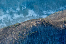Ramburg castle ruins in winter with snow in Ramberg in the state Rhineland-Palatinate, Germany