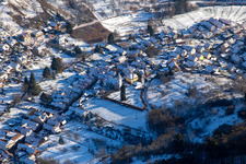 Church in winter with snow in Dernbach in the state Rhineland-Palatinate, Germany