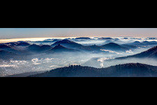 Panorama of the Palatinate Forest with Trifels Castle, Anebos Castle ruins and Scharfenberg above the Queichtal valley from the north in winter with snow in Annweiler am Trifels in the state Rhineland-Palatinate, Germany