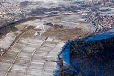 Oblique view of Keschdebusch vineyard from the west in winter with snow in Birkweiler in the state Rhineland-Palatinate, Germany