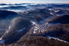 Aerial photograpy of From the northeast in winter when there is snow in Waldhambach in the state Rhineland-Palatinate, Germany