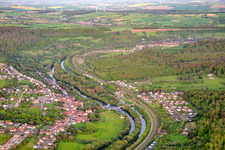 Saar and canal from the west in Sarreinsming in the state Moselle, France