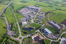 Aerial view of Industrial estate with KIMMEL LOGISTICS, KIMMEL LAVAGE, Dietrich Véhicules and Sarre Union Pl Services - MAN at the Sarre-Union toll station - A4 - Route No. 42 in Thal-Drulingen in the state Bas-Rhin, France