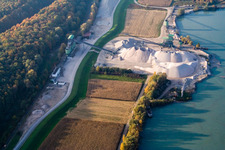 Oblique view of Gravel plant of WOLFF & MÜLLER Quarzsande at the quarry lake in Hagenbach in the state Rhineland-Palatinate, Germany