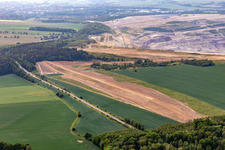 Aerial view of Demolition edge of the brown coal opencast mine "PGE Górnictwo i Energetyka Konwencjonalna Oddział Kopalnia Węgla Brunatnego Turów in Białopole in the state Lower Silesia, Poland